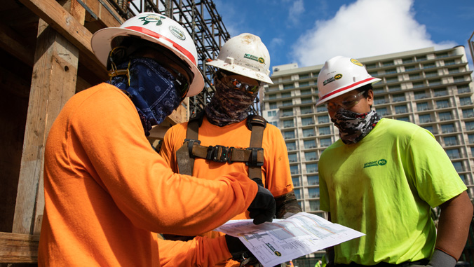 Carpenters working outdoors