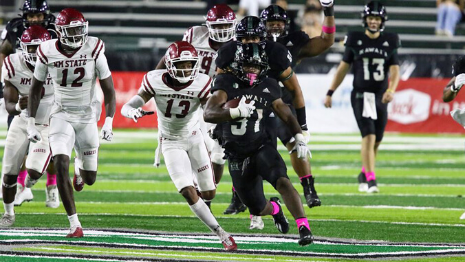 U H, New Mexico State football players