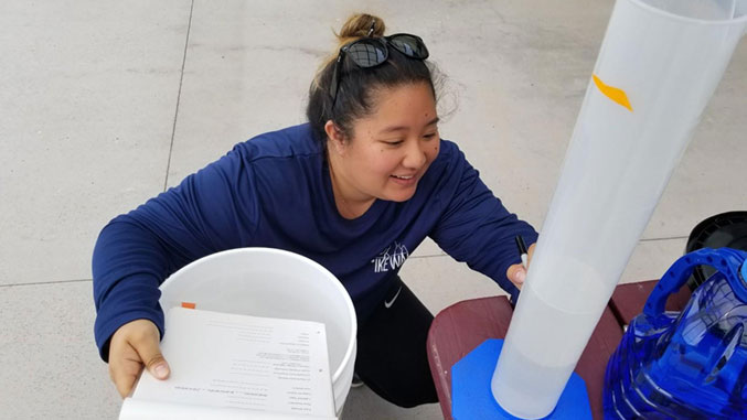 woman water sampling