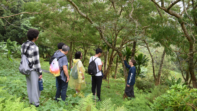 person talking to a group of people