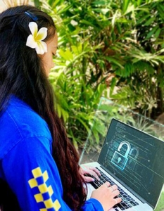 woman looking at a computer