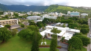 aerial shot of buildings and mountains