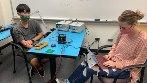 students working on computer