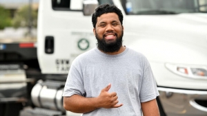 person waving shaka