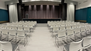 chairs facing a stage