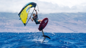 boy windsurfing