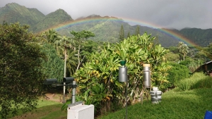 Various measuring instruments in valley with a rainbow