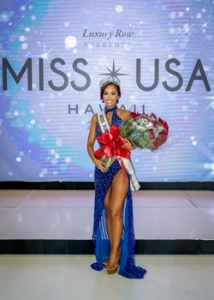 person in a blue pageant gown