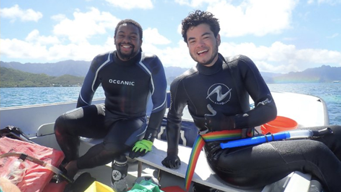 two students on a boat