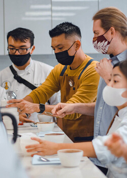 students brewing coffee