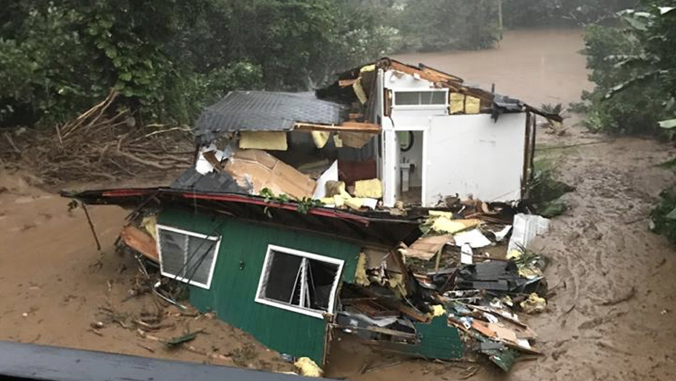 house damaged due to flooding