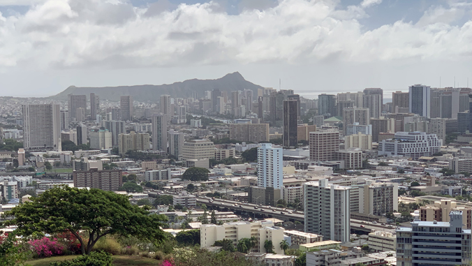 scenic shot of buildings and mountains