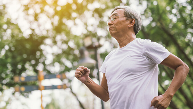 person in a white t shirt running