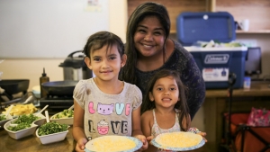 children smiling with food