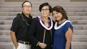 three people smiling