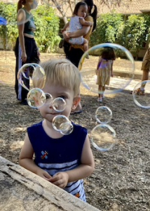 boy with bubbles in front