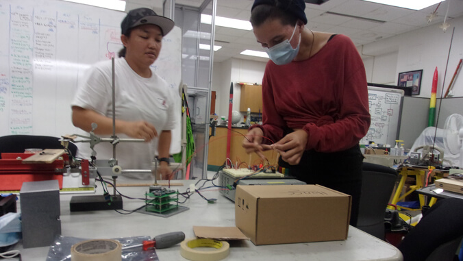 Two people working in a lab