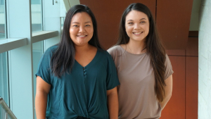 two females smiling