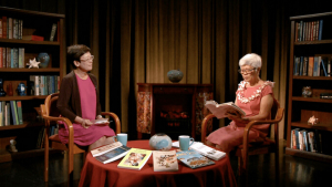 Two people in a reading room
