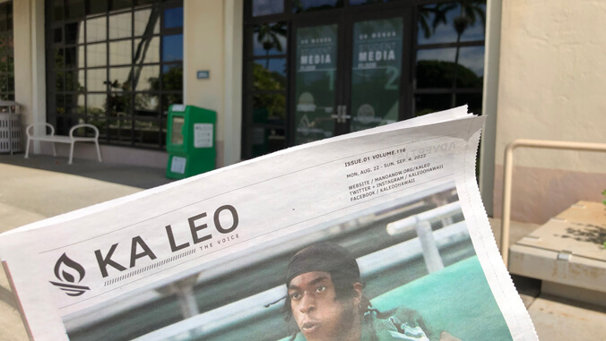 newspaper in front of a building