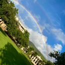 Tilted view of Hawaii Hall with a rainbow