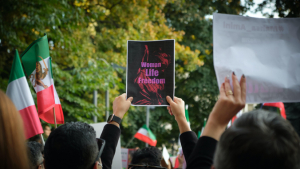 people raising signs