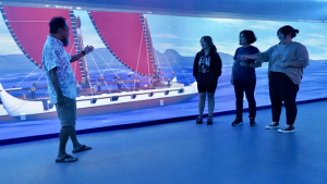 instructor at digital studio wall