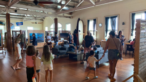 Families walking around a room