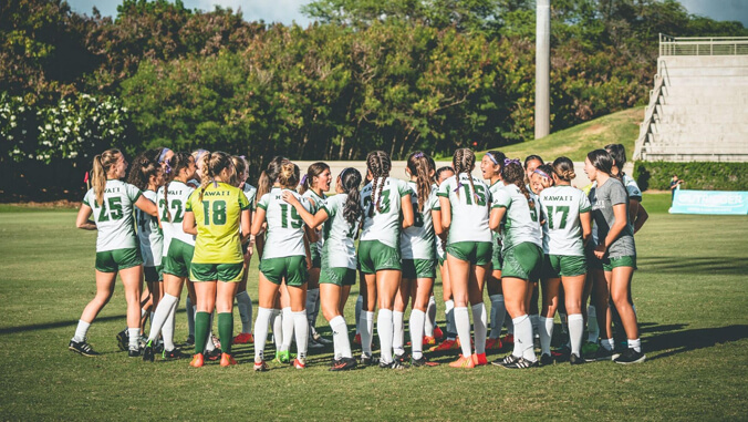 U H women's soccer players