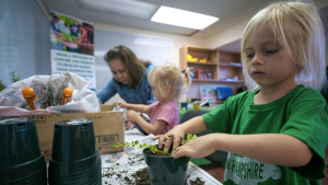 children potting plants