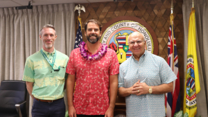 three men smiling