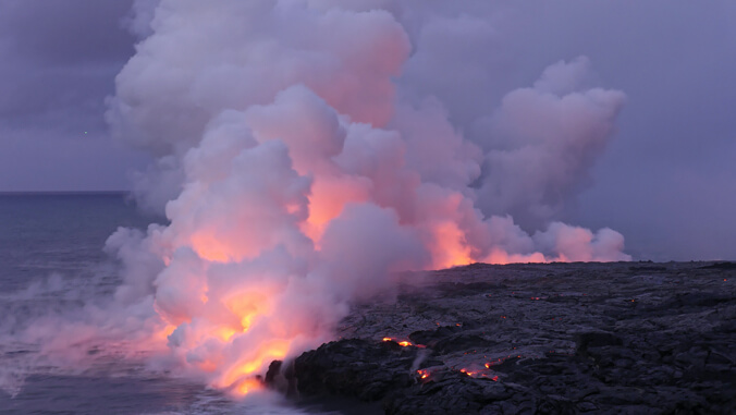 smoke and lava from the ocean