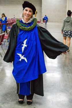 Pagotto wearing graduation regalia