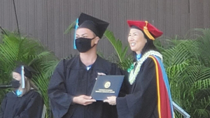 Person receiving diploma