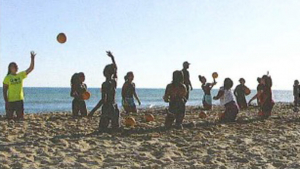 Athletes practicing on the beach