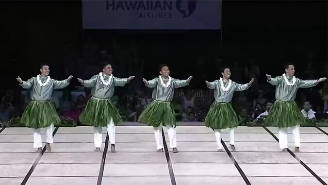 Men performing hula