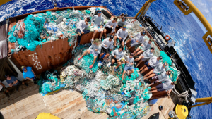 people sitting on marine debris in boat