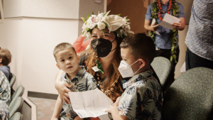 woman with two young boys