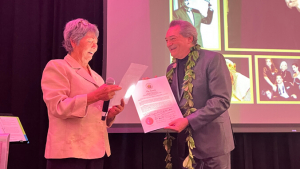 person presenting a certificate to another person