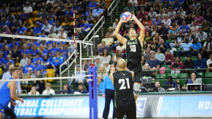 person with a volleyball setting