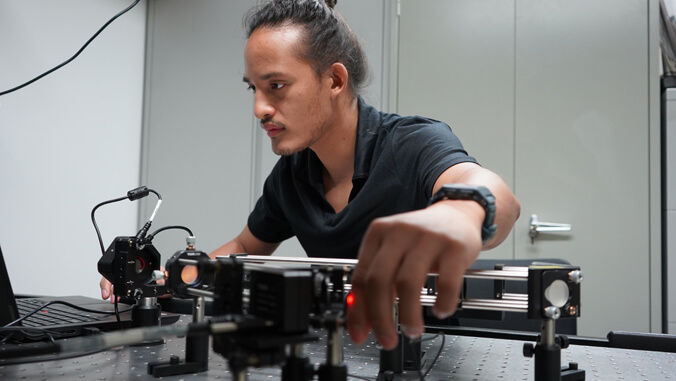 Christian Falcon working on an electronics project