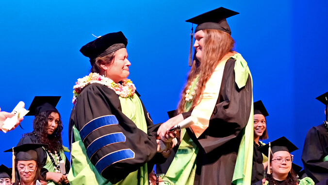 Emotions run high as Windward CC chancellor’s daughter earns degree as HS student