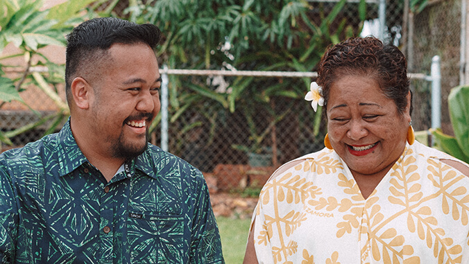 two people smiling