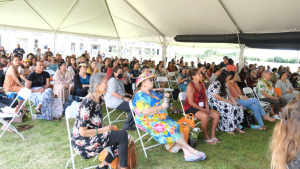 people under a tent