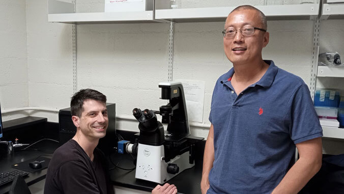 Tao and Warecki in their lab