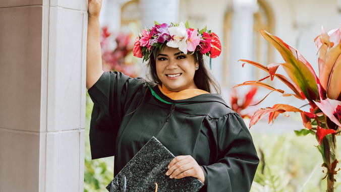 Kiana Perez-Santos in her graduation gown