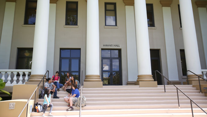 students sitting at hawaiʻi hall