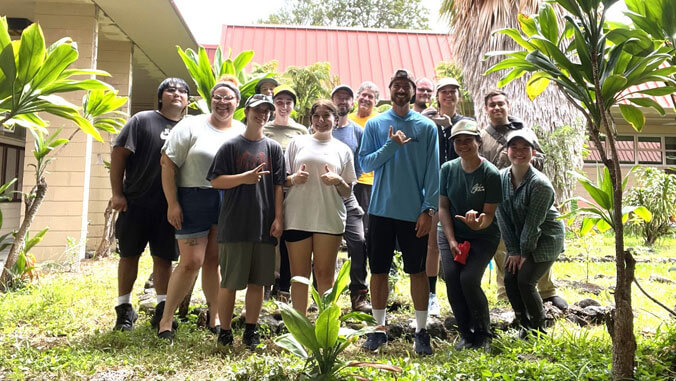 Students standing in garden