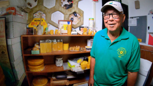 Francis with a beeswax collection