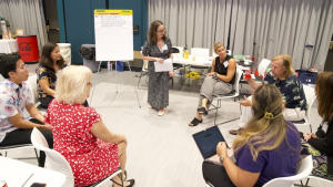 people sitting in a circle having a discussion